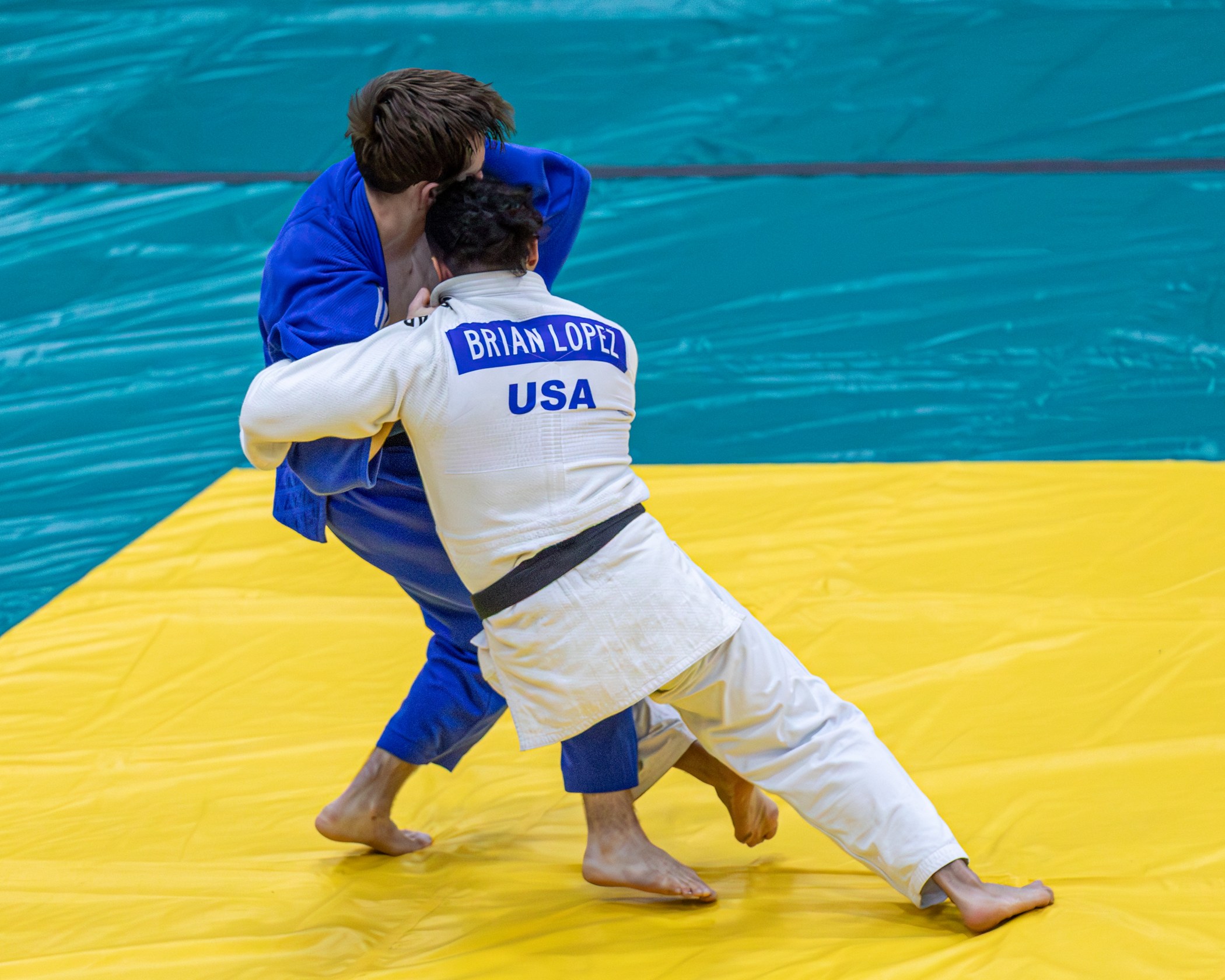 Two judoka establishing grips and balance